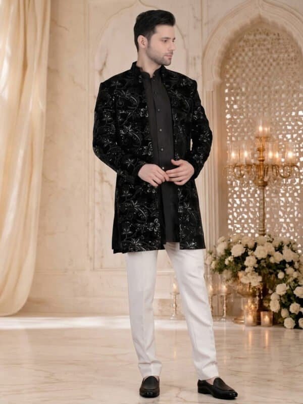 Black embroidered indo western sherwani with white churidar for men wedding festive wear