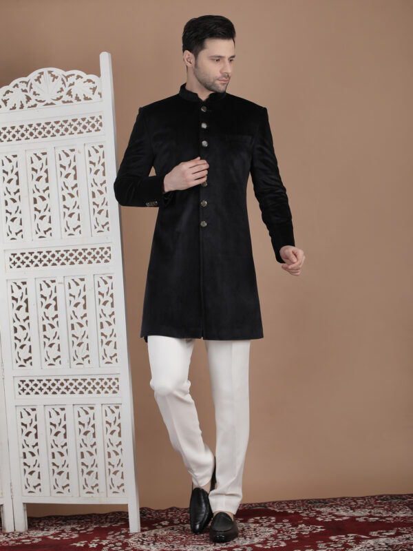 Black reception sherwani in cotton velvet with clean minimal design and tailored fit