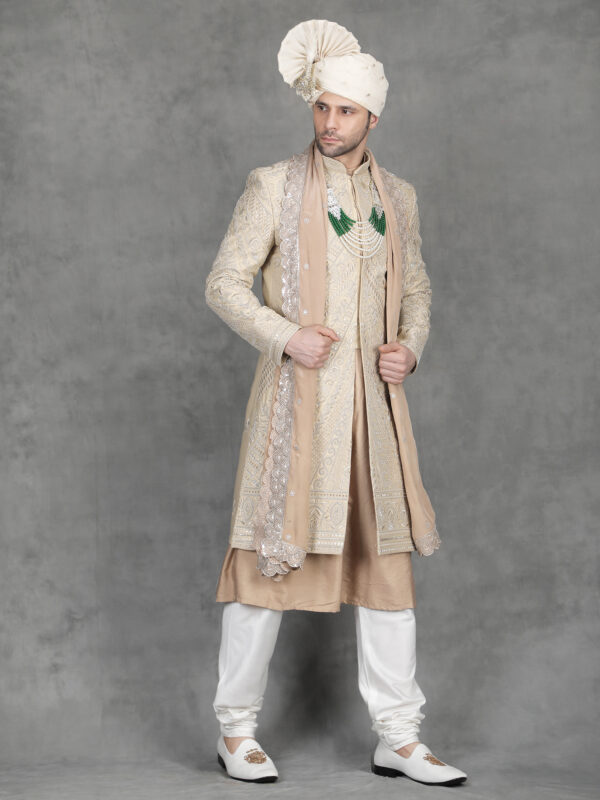 Gold zari embroidery sherwani for groom with detailed diagonal pattern and heavy traditional work