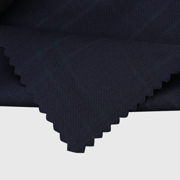 Navy blue pinstripe suiting fabric with a fine textured weave, premium formal wear material ideal for tailored suits, blazers, trousers, waistcoats, and professional apparel.