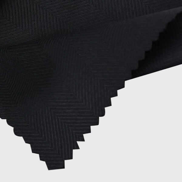Premium Black Suiting Fabric with Textured Geometric Weave Pattern by Deshi Coast
