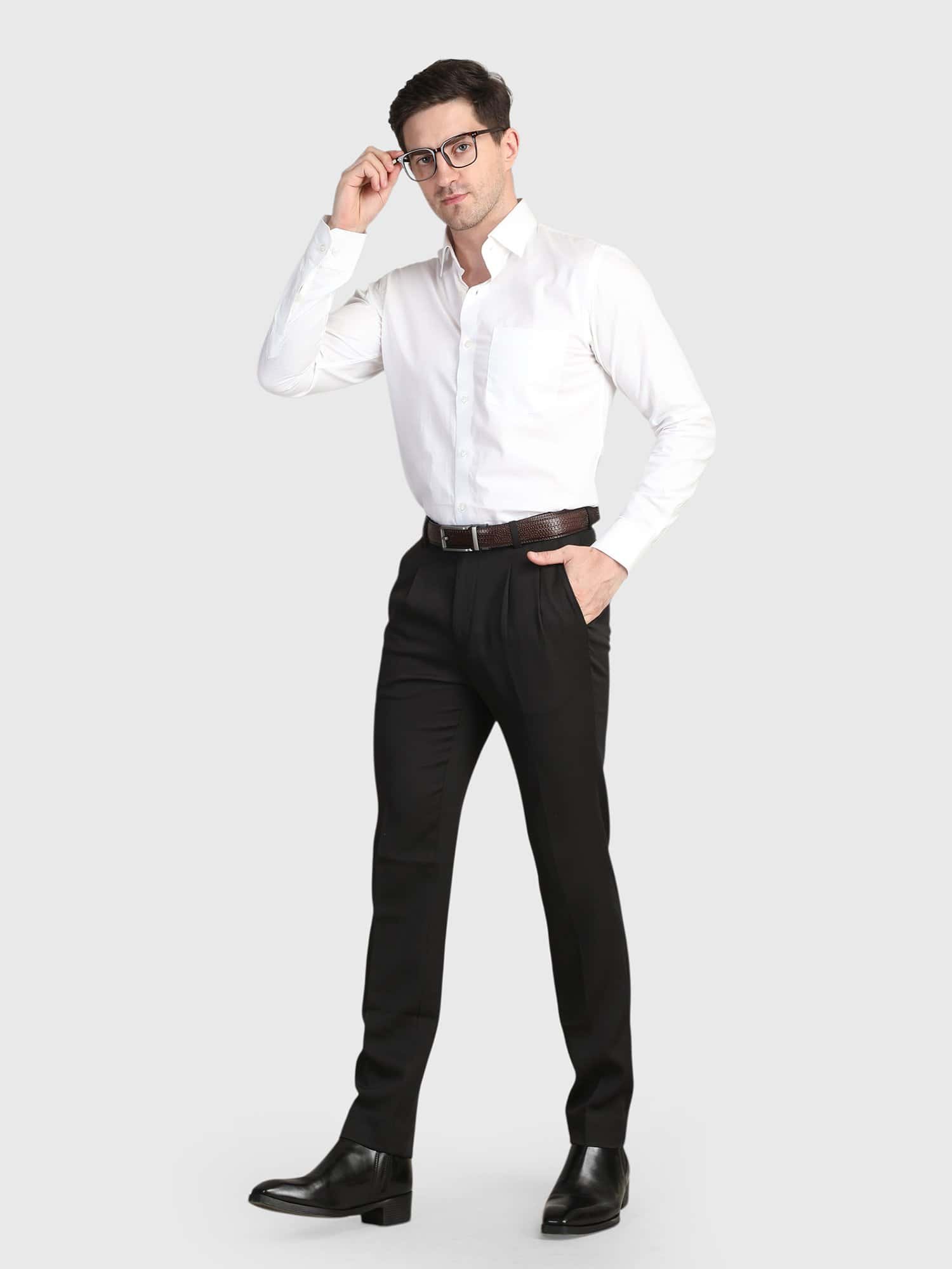Black pleated trouser for men with tailored fit and premium styling by Deshi Coast